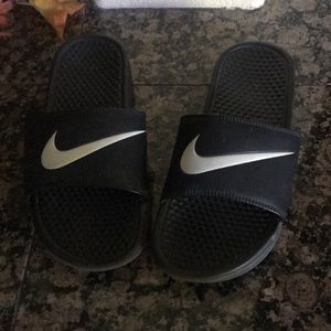 Black Nike slides